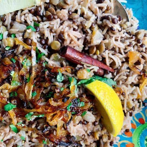 Instant Pot Mujadara is served with lemon slices.