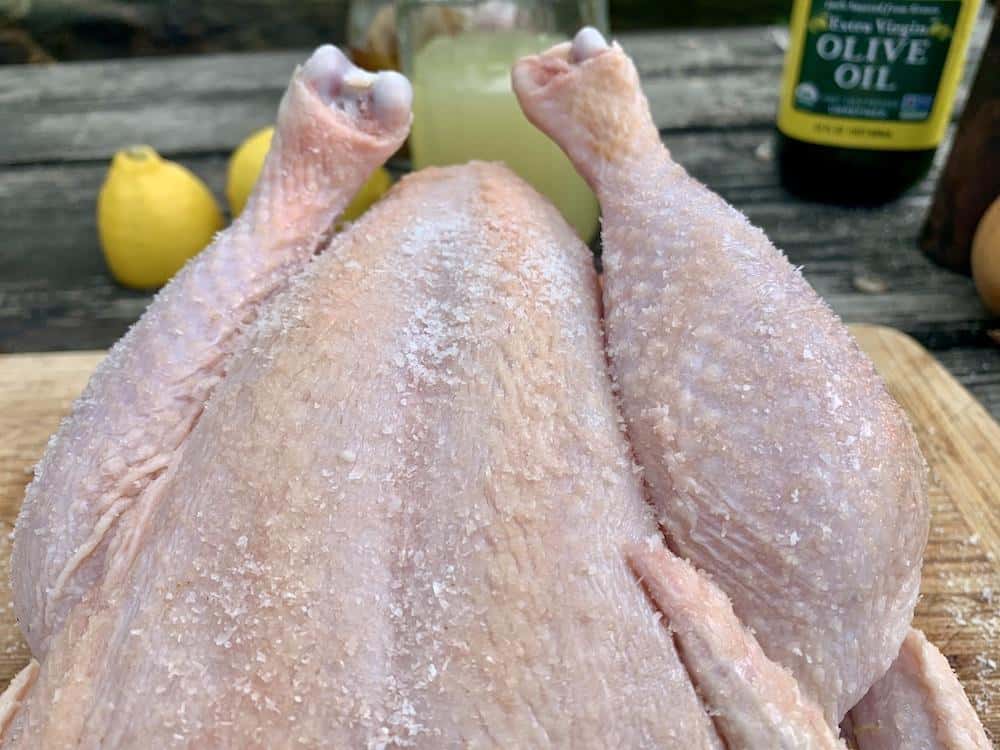 Here is the salted chicken ready for rubbing the spices on top.