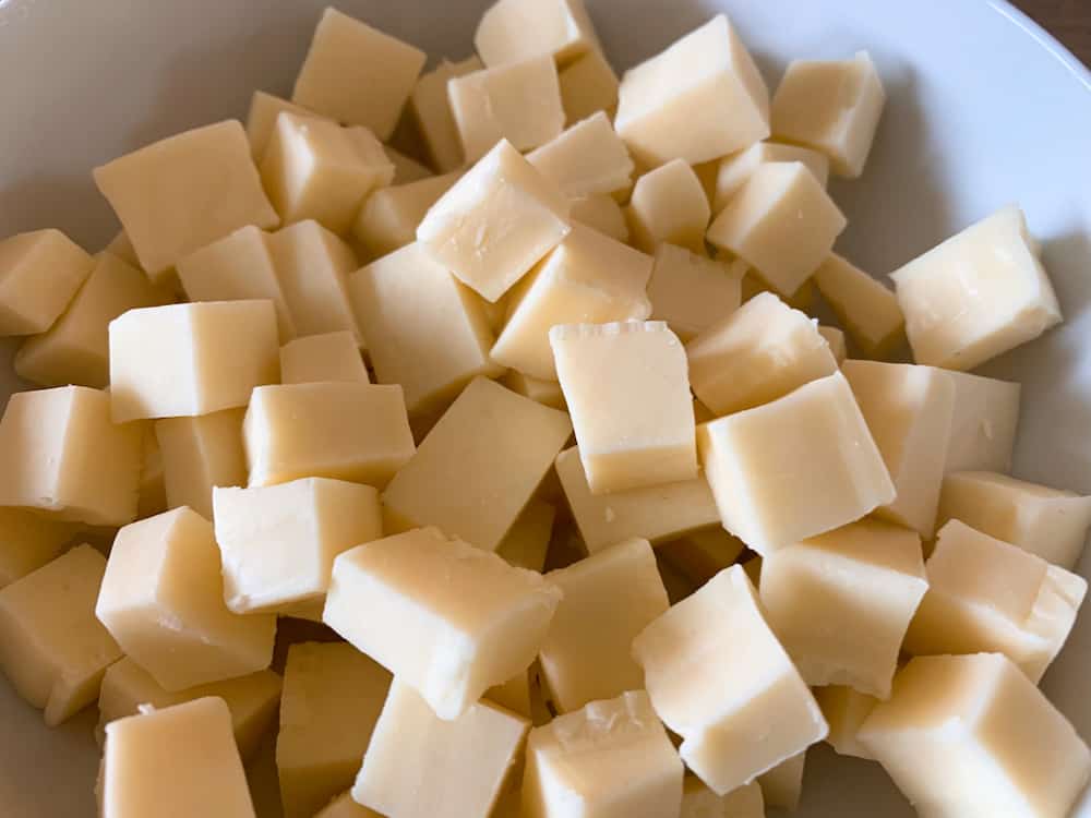 Cubes of Monterey jack cheese are ready for mixing into the casserole.