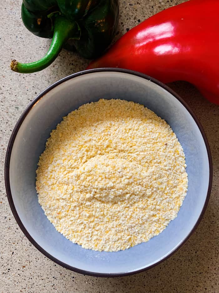 Whole grain cornmeal has a heartier texture that can be seen easily, such as this Bob's Red Mill cornmeal.