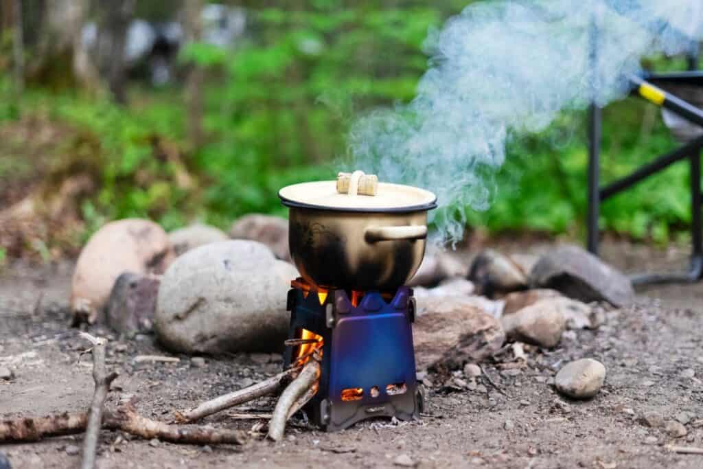 Cooking canned foods in a pot over the campfire is easy.