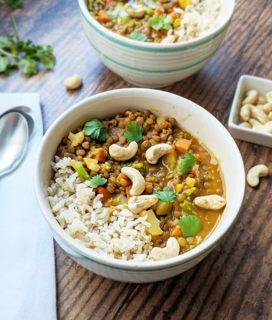 Coconut lentil curry is a healthy dish that can easily be made while camping if using canned lentils.