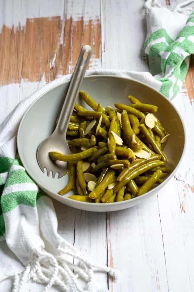 Canned green beans are a popular canned food item for camping meals.