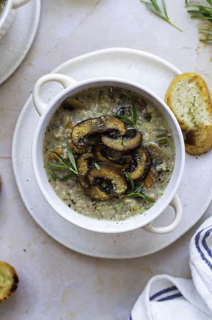 Wild rice and mushroom soup is a fantastically delicious camping soup for vegetarians and meat-eaters alike!