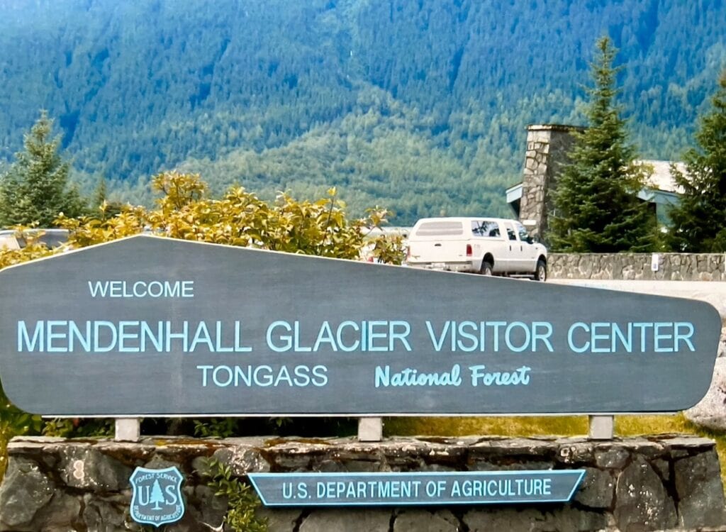 The Mendenhall Glacier Visitor's Center is marked with this sign and is a great place to visit in Juneau!