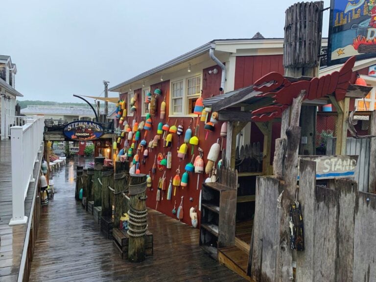Bar Harbor, Maine has adorable quintessential seaside buildings such as Stewman's Downtown, with walls lines with lobster buoys.
