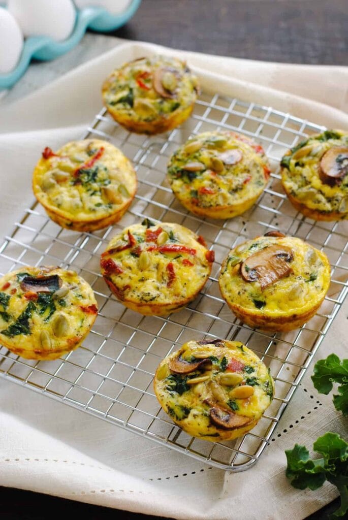 Make ahead camping breakfasts should include protein and these adorable and colorful egg cups are chick full of veggies.