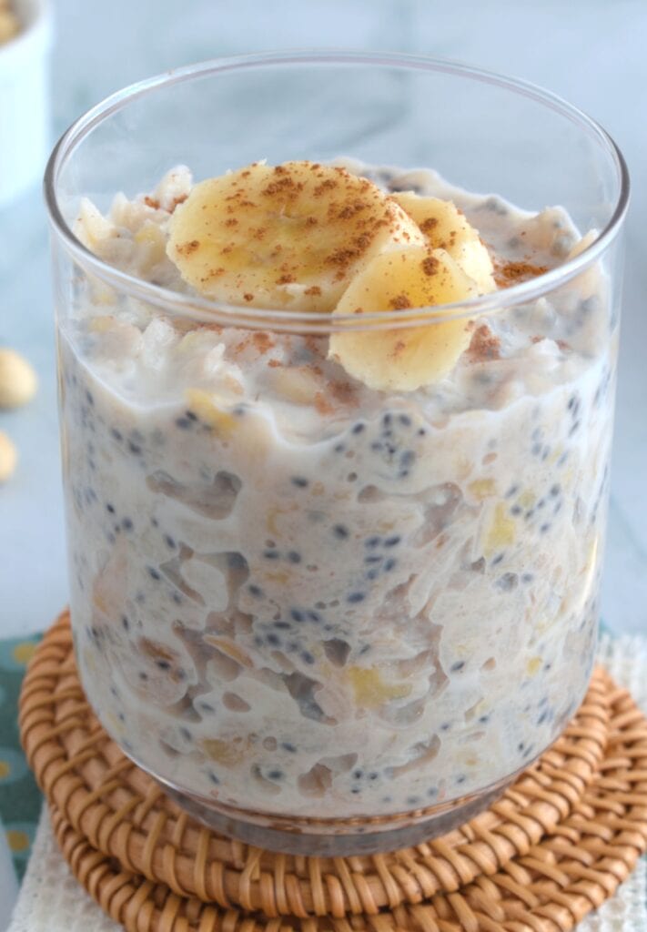 A delightful jar of Cinnamon Banana Overnight Rice Flakes, a comforting and make-ahead camping breakfast brimming with flavors.