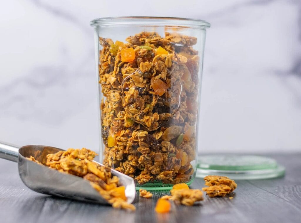 A close-up of crunchy and wholesome granola, a versatile and make-ahead breakfast option perfect for camping adventures.