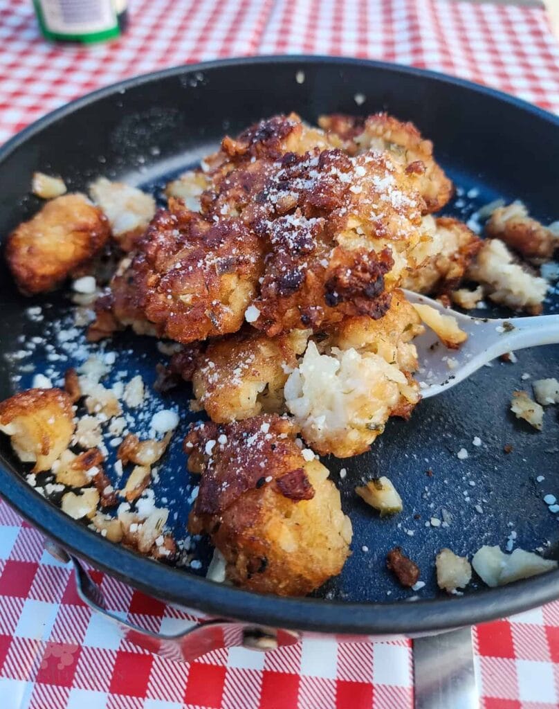 This crispy golden tater tots are salted and ready to serve for breakfast.