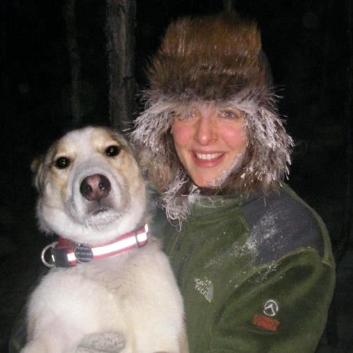 This is me, Heather, wearing a beaver fur hat and a green fleece hugging my dog. I am very frosty from a walk with my Alaskan husky, pictured here.