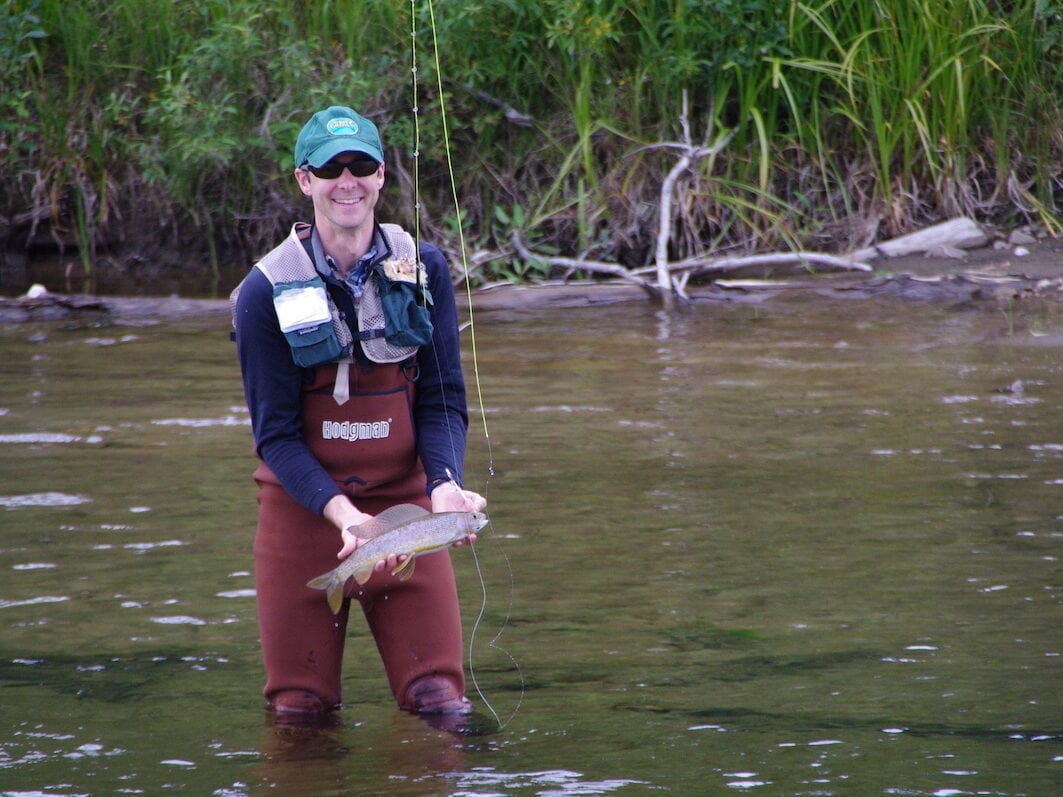 This is my husband, Matt showing his grayling catch.