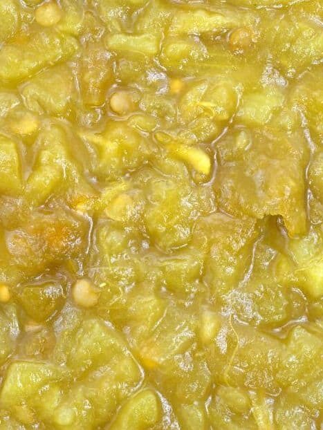 The diced green chiles are seen close up, a nice blend that is a pale bright green.